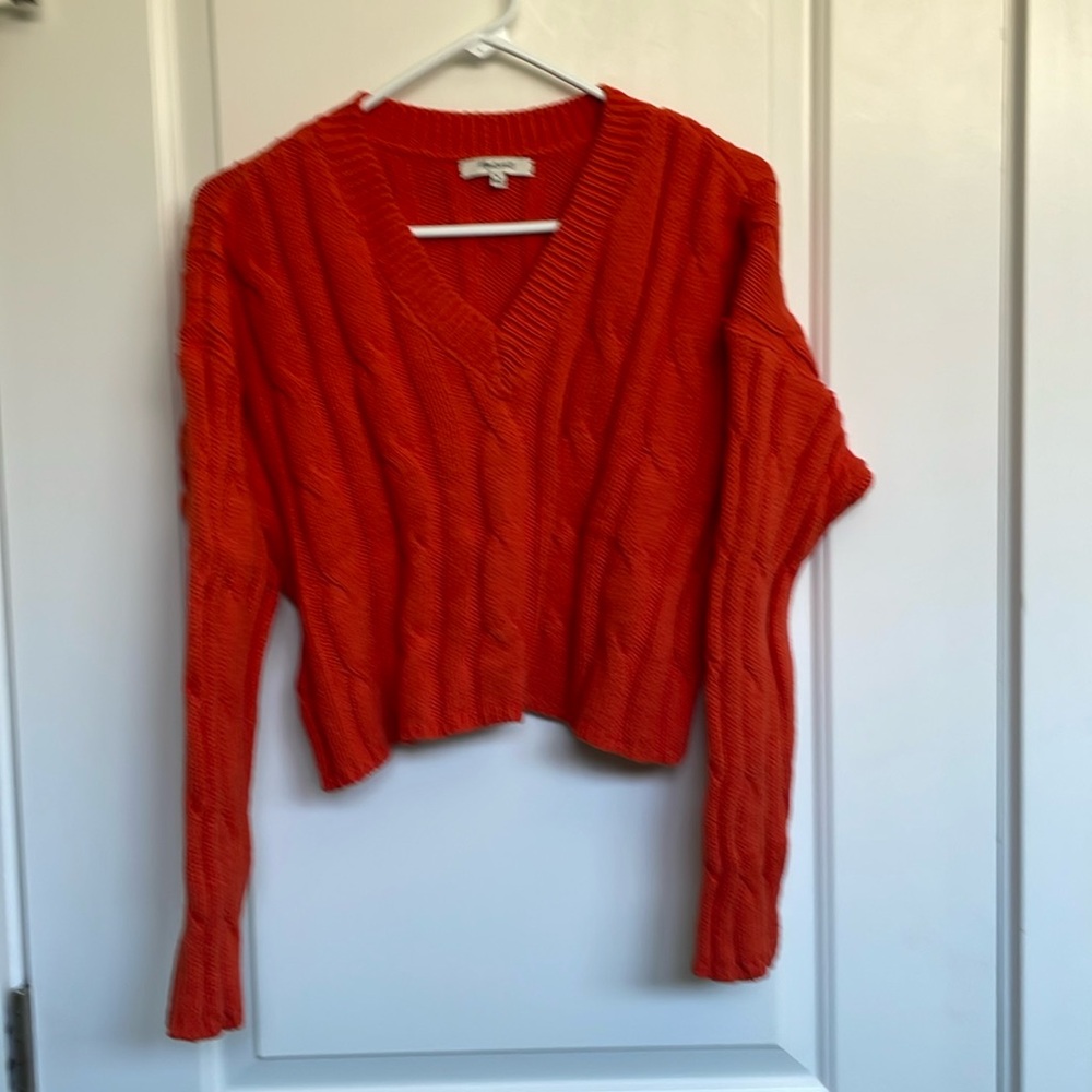 Red cable knit sweater